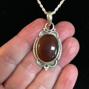 Silver & carnelian pendant.